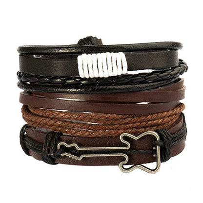 Bracciale in pelle e lega di zinco. Set 4 pezzi, misura regolabile da 26 a 31 cm.